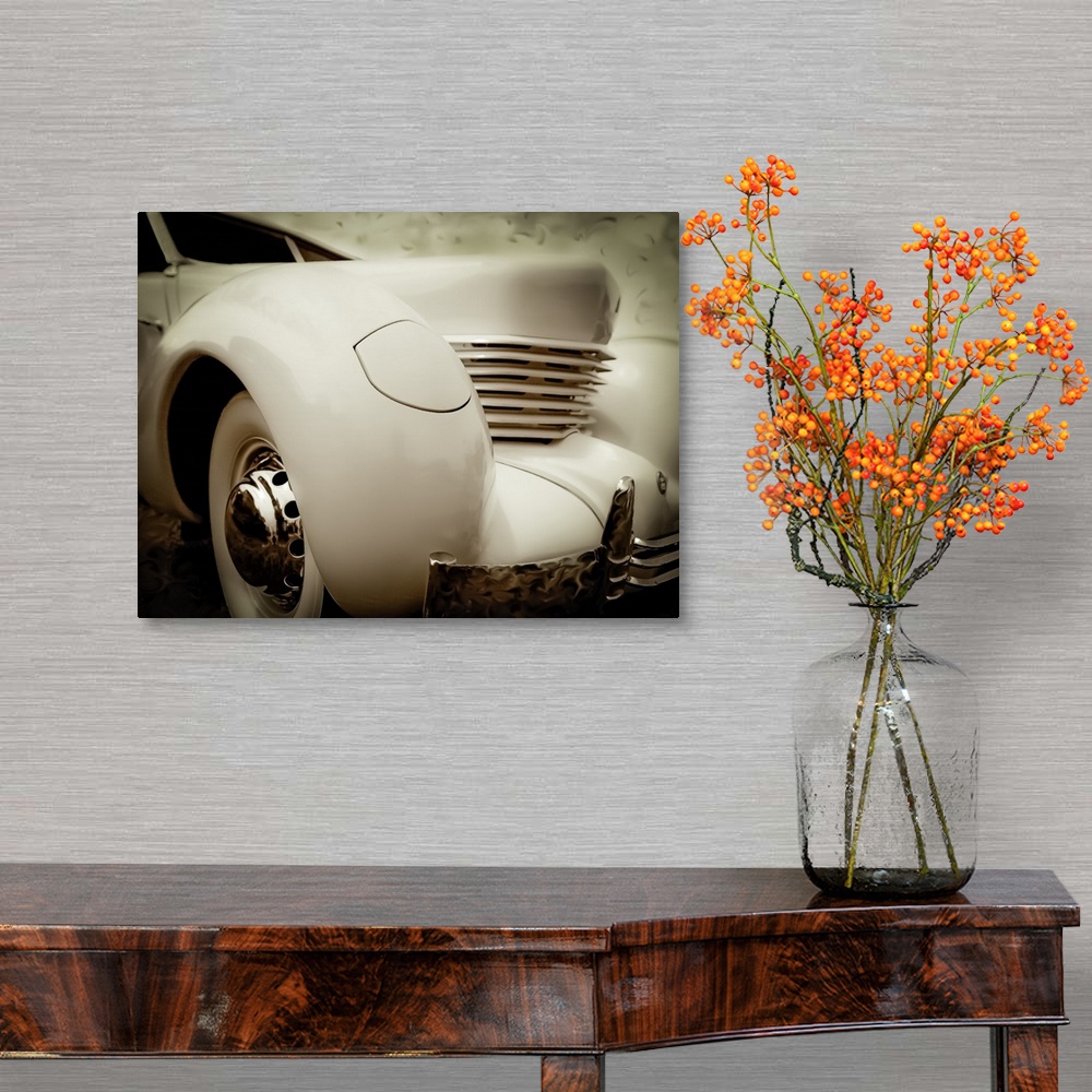 A traditional room featuring Artistic photograph of a vintage car.