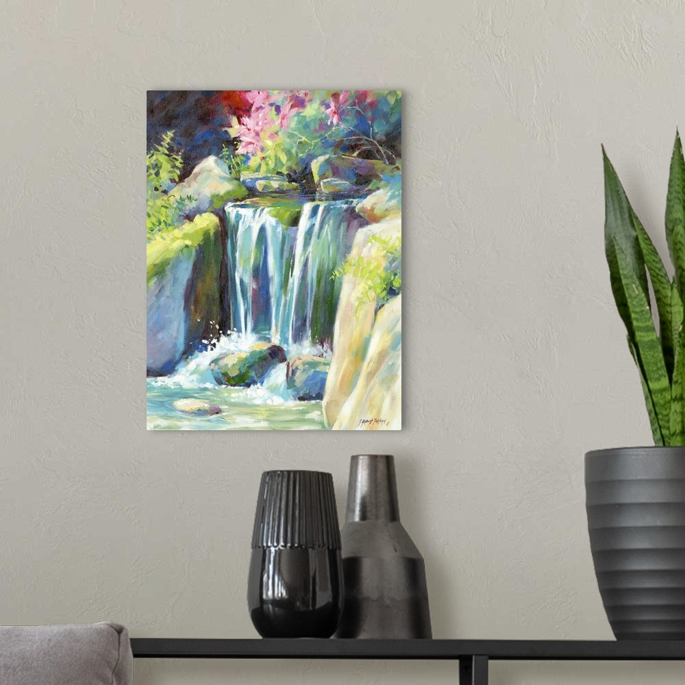 A modern room featuring Contemporary watercolor painting of a small waterfall rushing down over rocks.