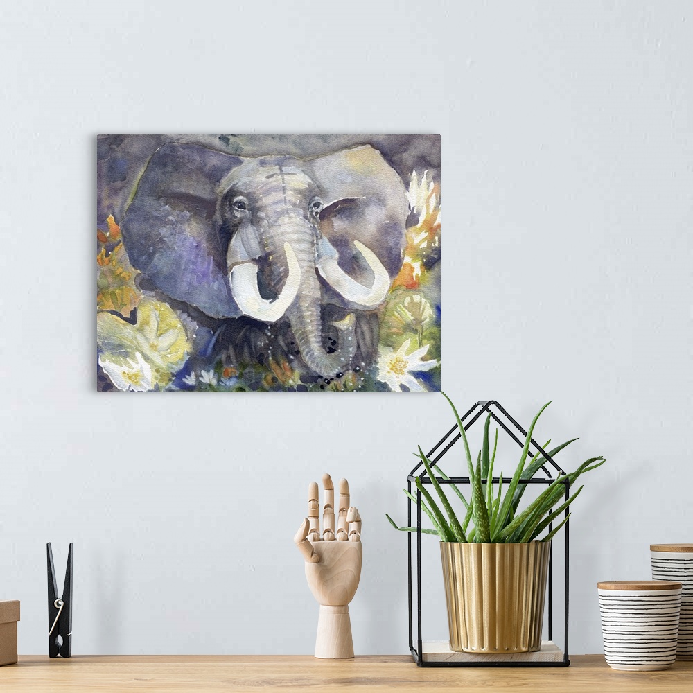 A bohemian room featuring Artwork of an African Elephant with large tusks surrounded by lotus flowers.
