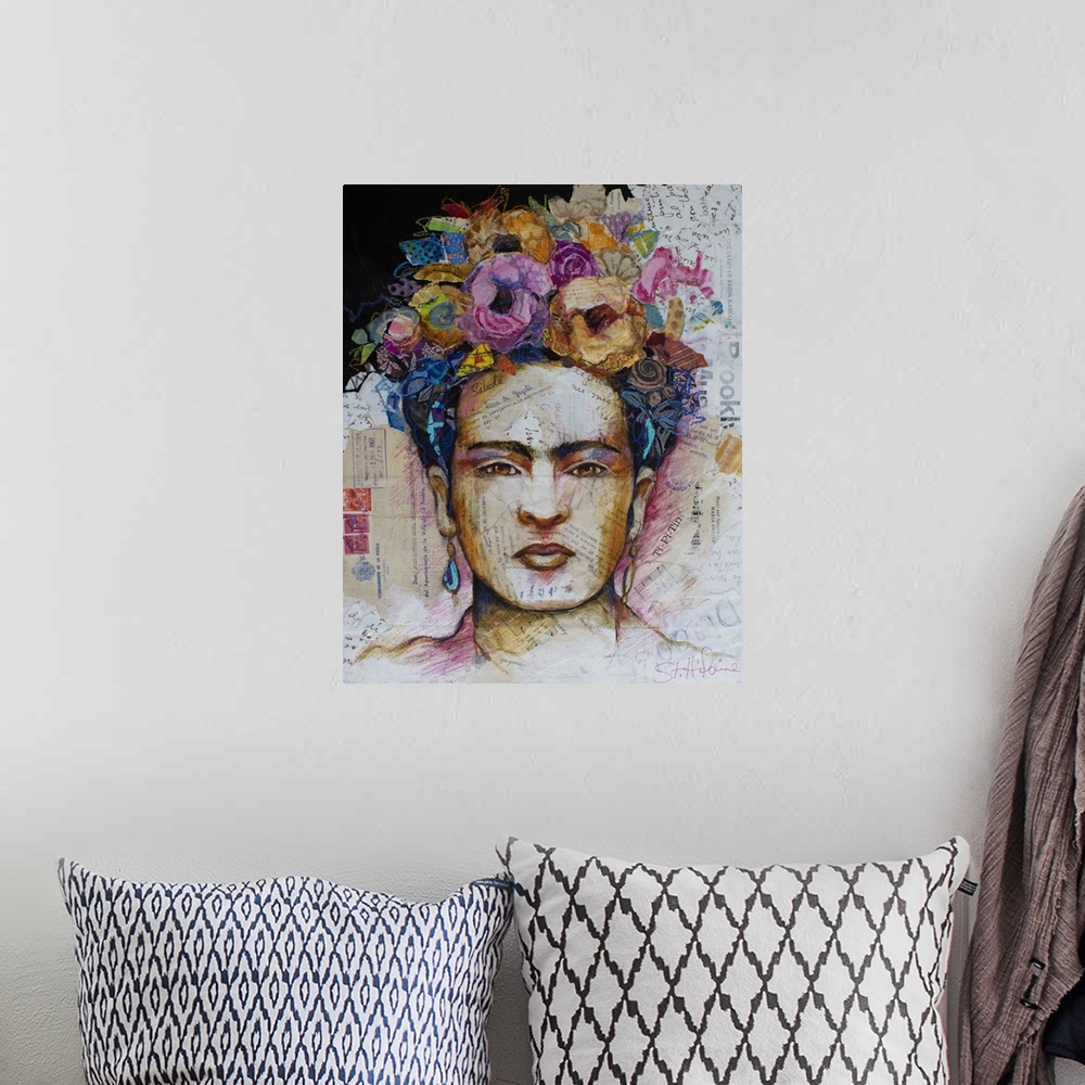 A bohemian room featuring Frida Kahlo collage with floral head piece.