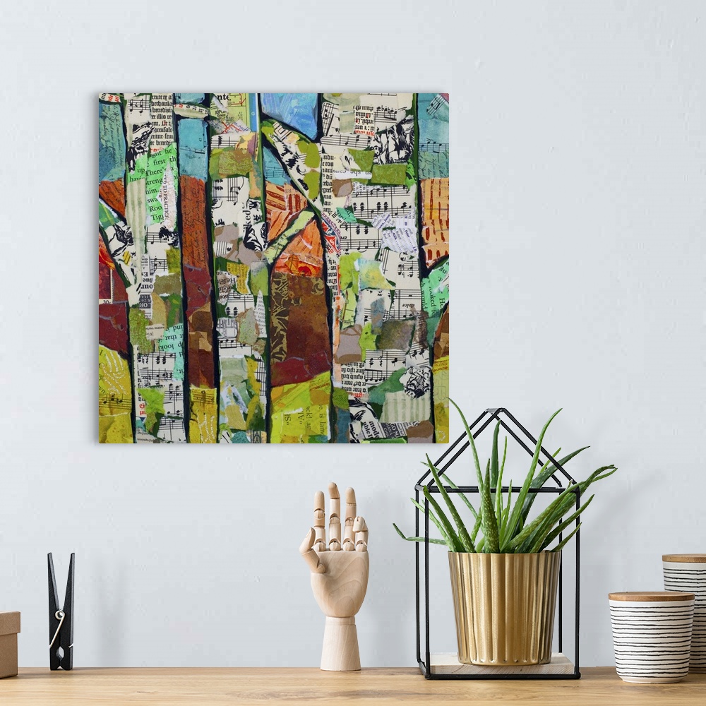 A bohemian room featuring Painting of three trees with found collage elements.