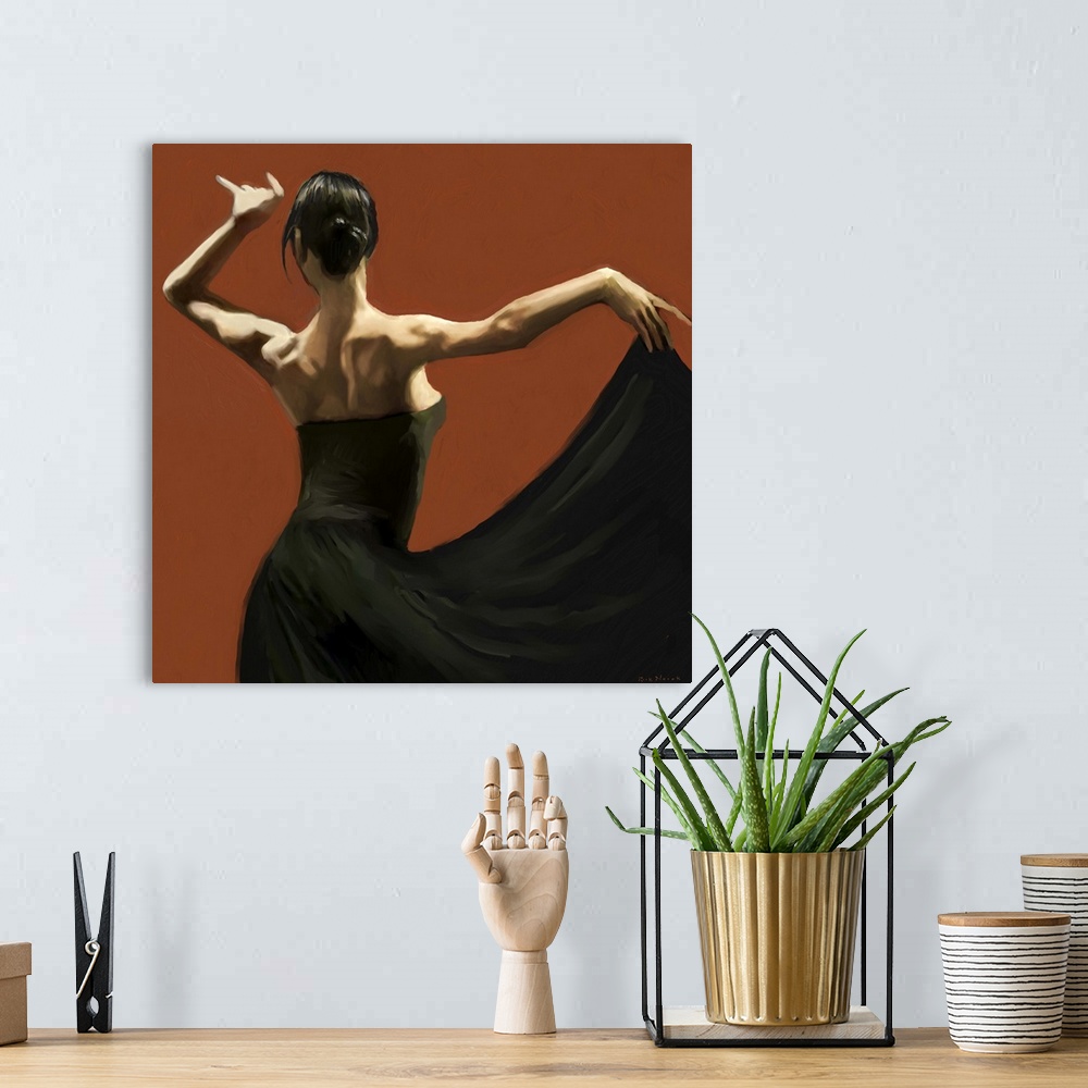 A bohemian room featuring Dramatic lighting on the shoulders of a female Flamenco dancer in a long black dress against deep...