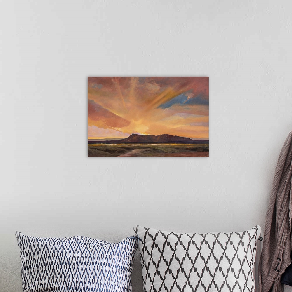 A bohemian room featuring Contemporary painting of an idyllic desert landscape.