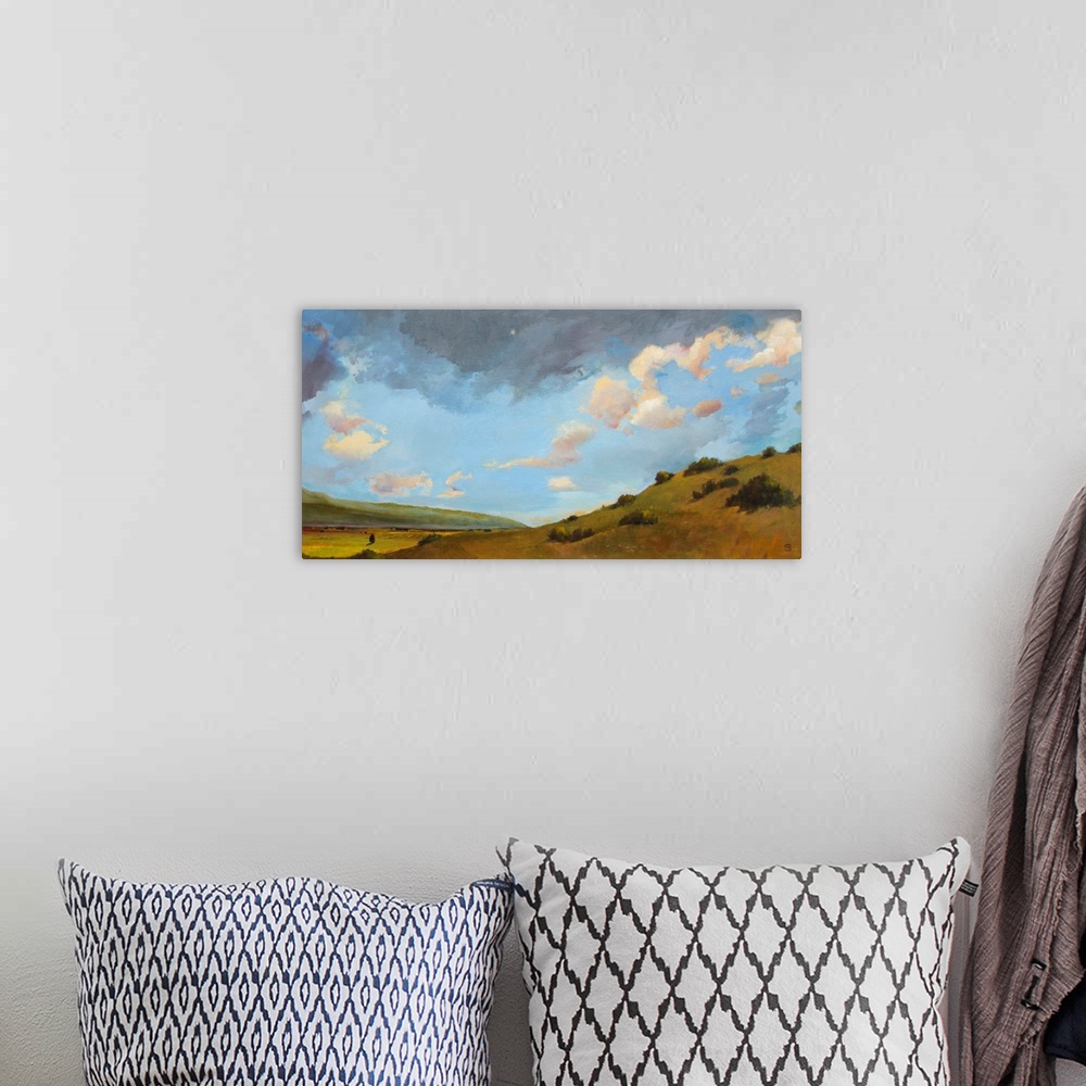 A bohemian room featuring Contemporary painting of an idyllic desert landscape.