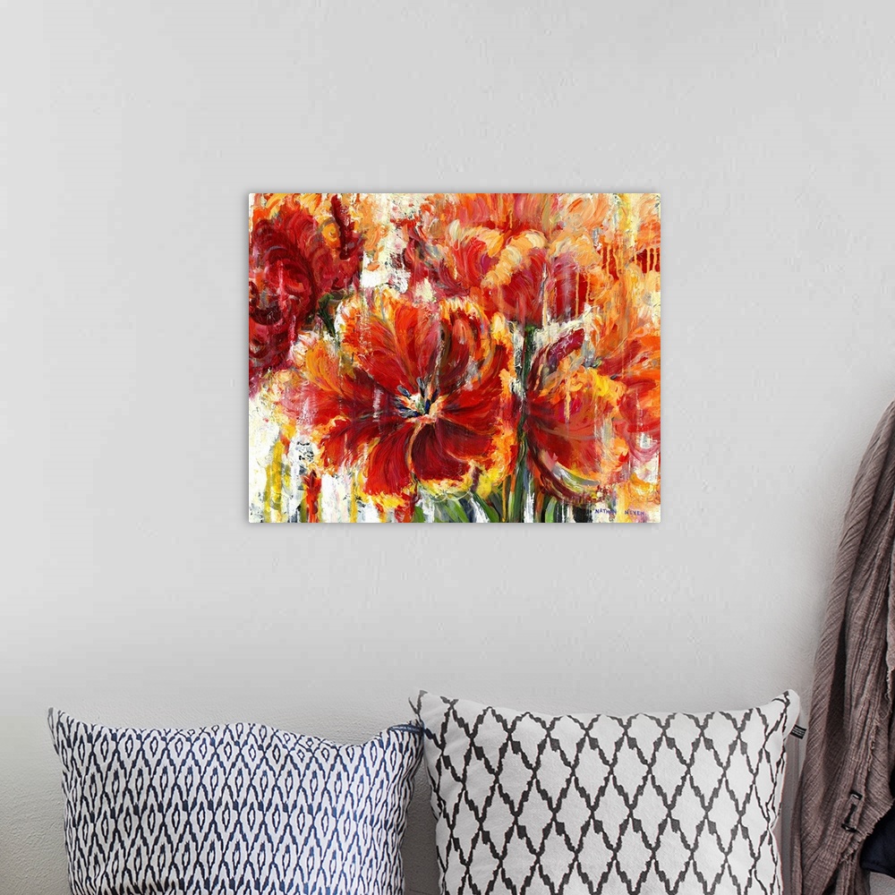 A bohemian room featuring Contemporary artwork of fiery red and yellow flowers.