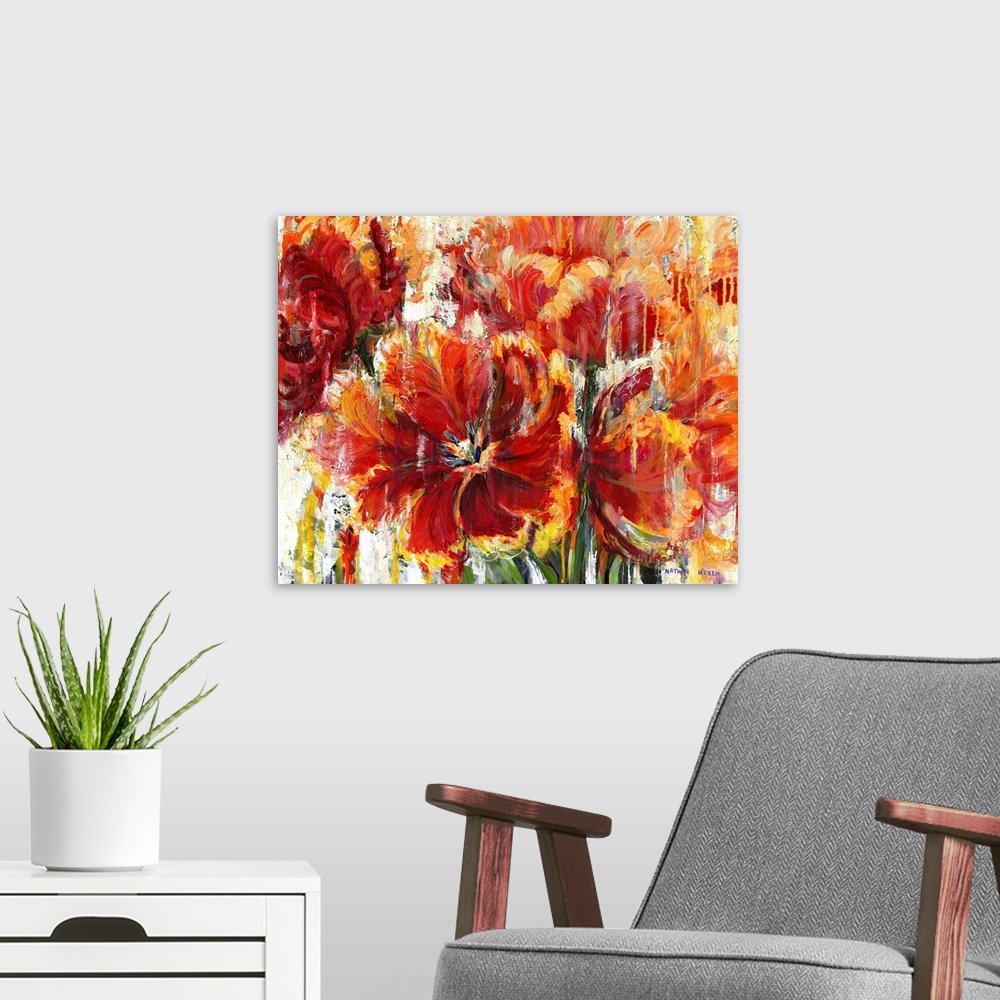 A modern room featuring Contemporary artwork of fiery red and yellow flowers.