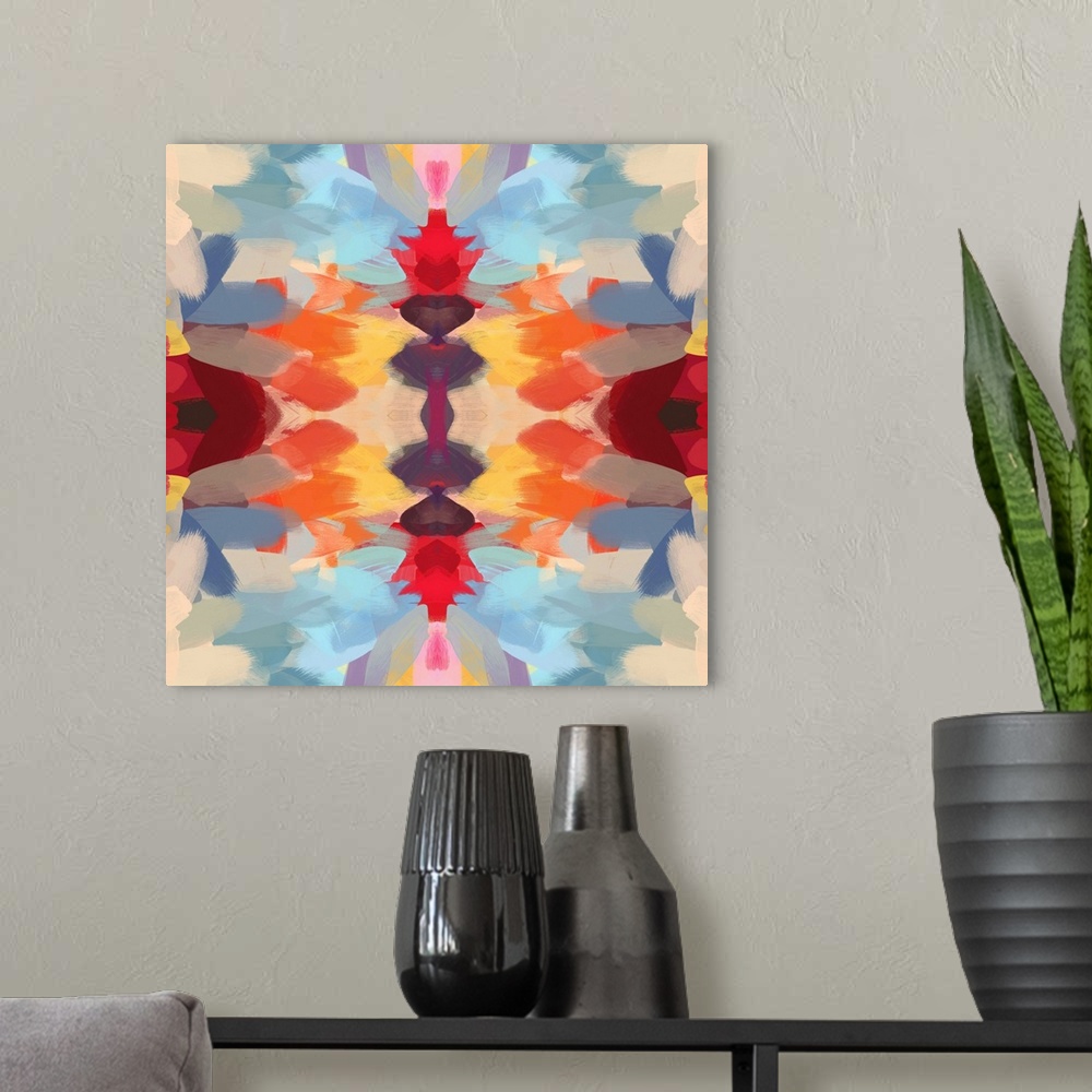 A modern room featuring Kaleidoscopic abstract pattern in shades of red, orange, and blue.