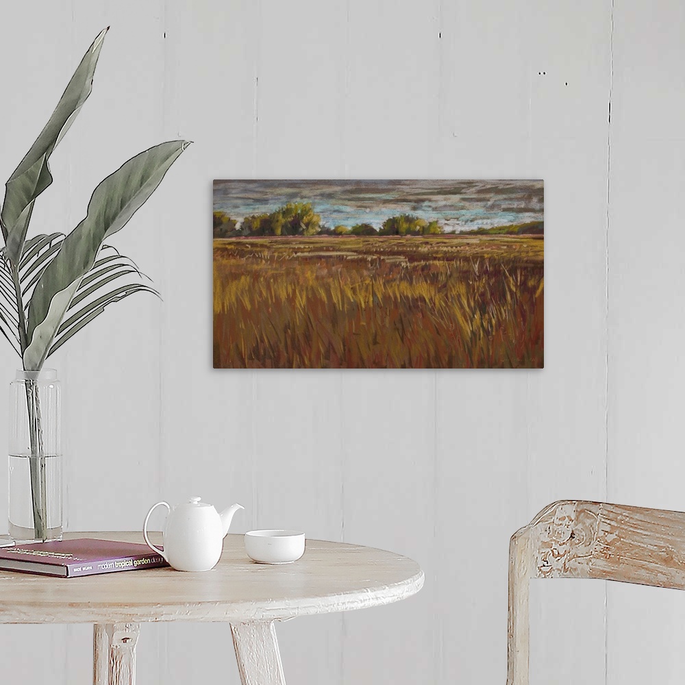 A farmhouse room featuring Pastel landscape painting of pastoral countryside with trees, fields and clouds.
