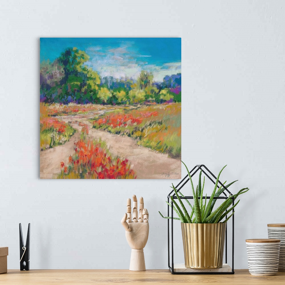 A bohemian room featuring Pastel landscape painting of English countryside with trees and poppies.