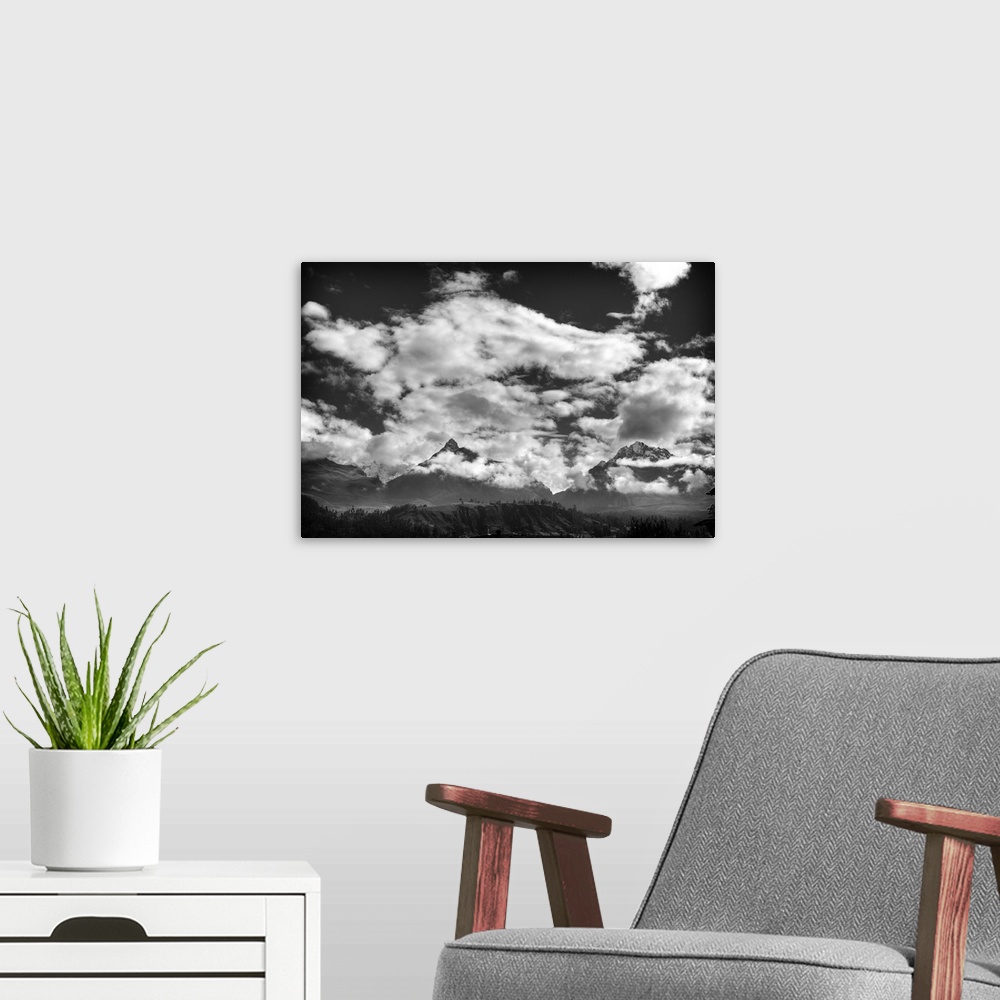 A modern room featuring Pyramids Mountains and Clouds Black and White