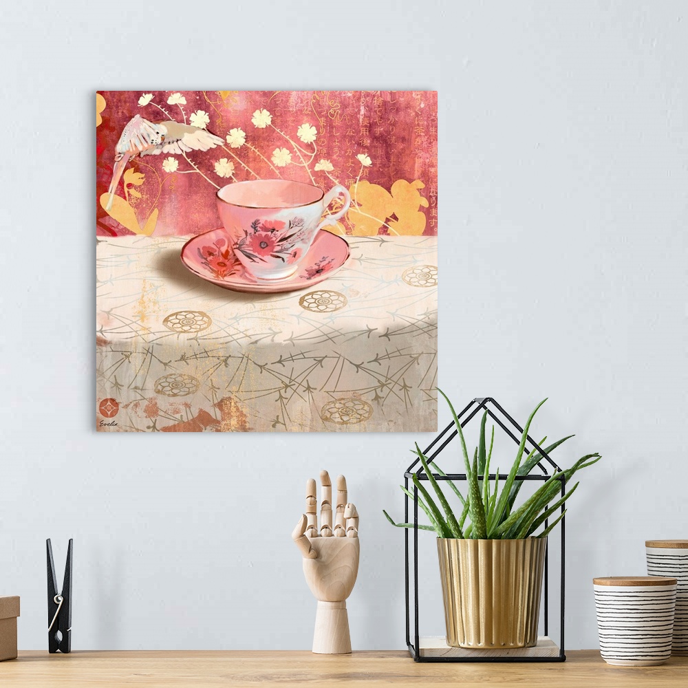 A bohemian room featuring Contemporary artwork of a golden teacup sitting on a floral tablecloth.