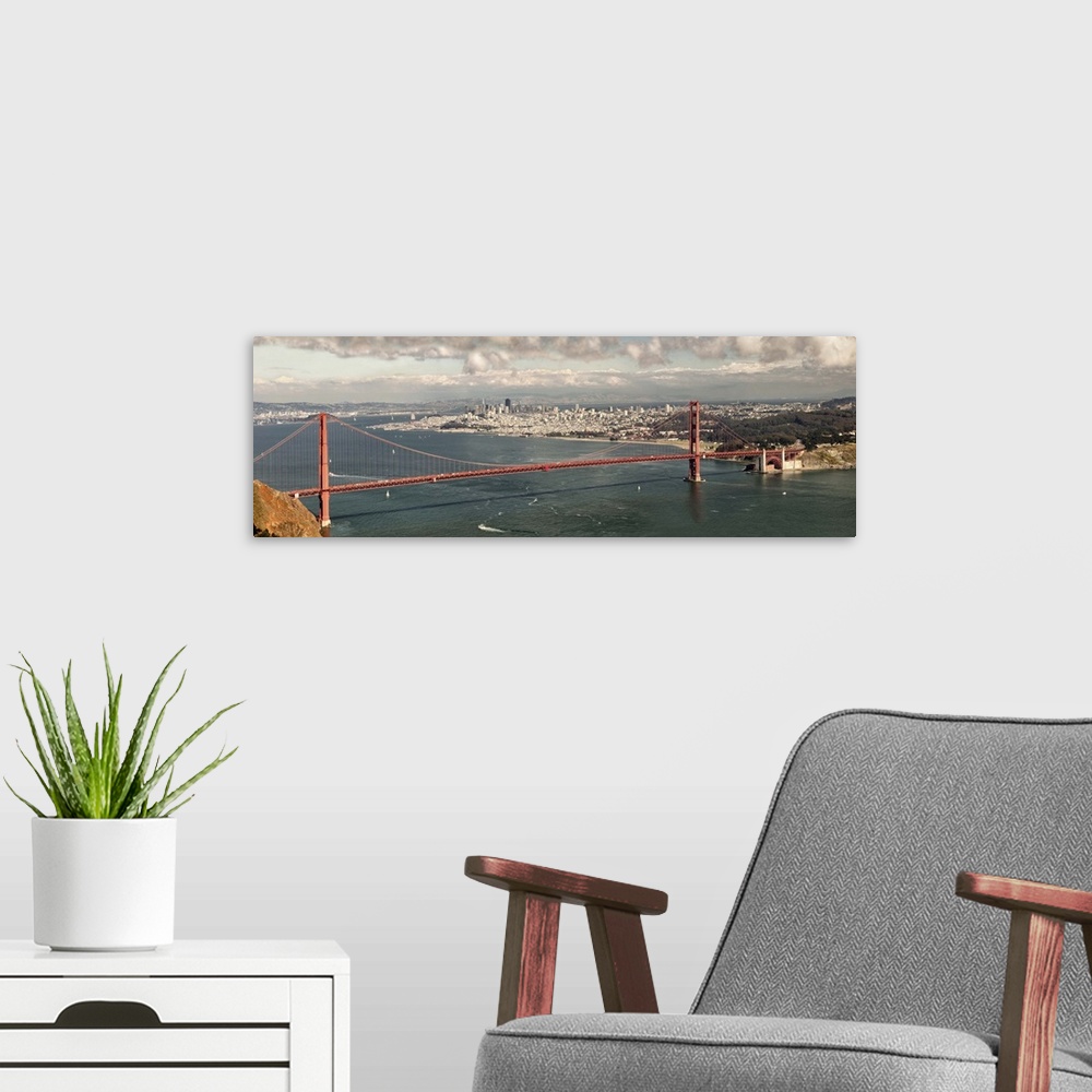 A modern room featuring Panoramic photograph of the Golden Gate Bridge in San Francisco bay.