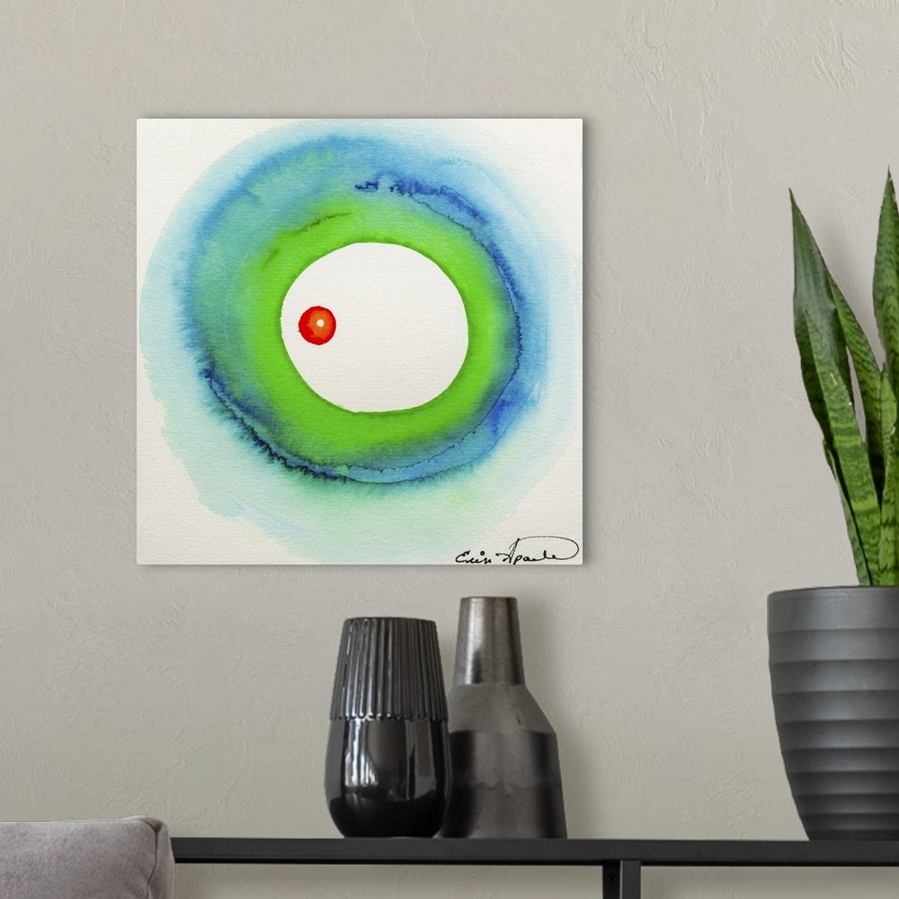 A modern room featuring A small red circle appears to float cradled in the center of a soft green and blue wash of color.