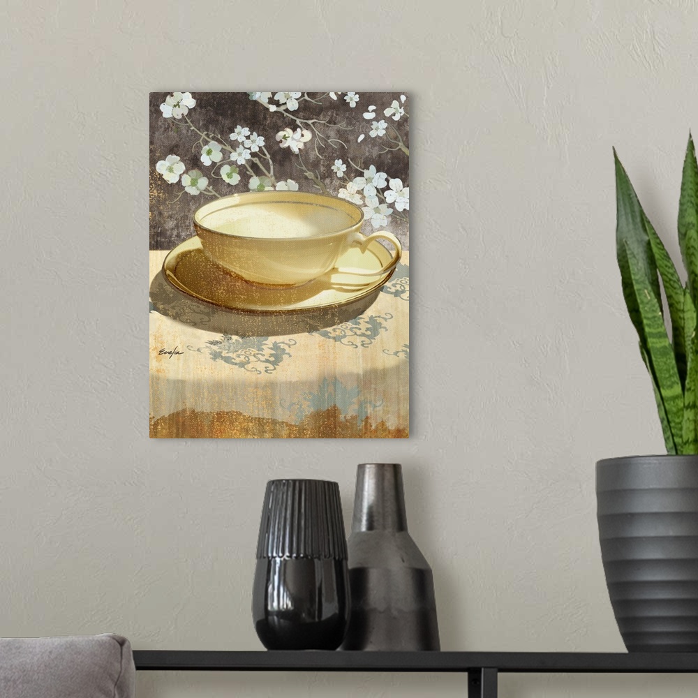 A modern room featuring Contemporary artwork of a golden teacup sitting on a floral tablecloth.