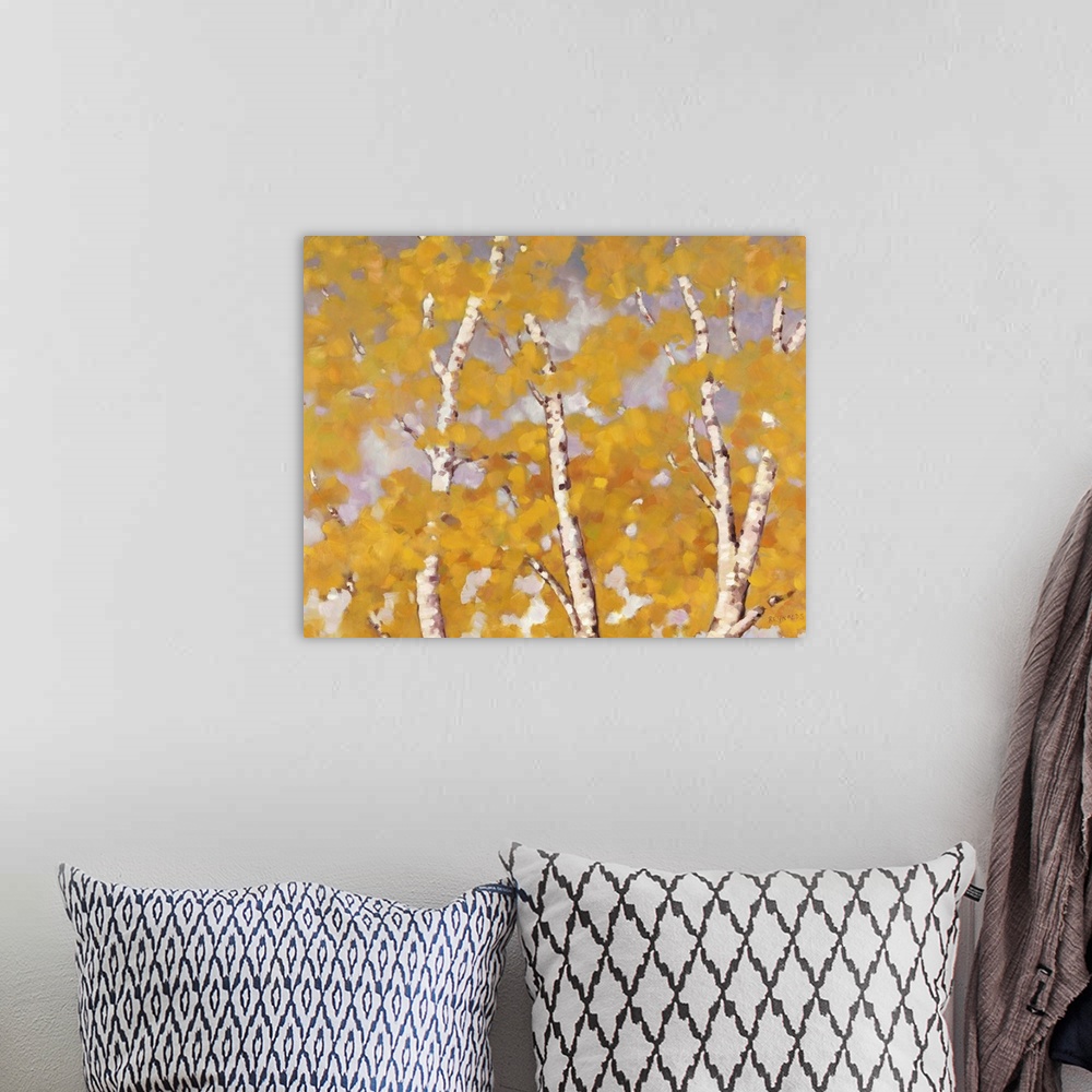 A bohemian room featuring Contemporary painting of slender birch trees filled with orange leaves in the fall.