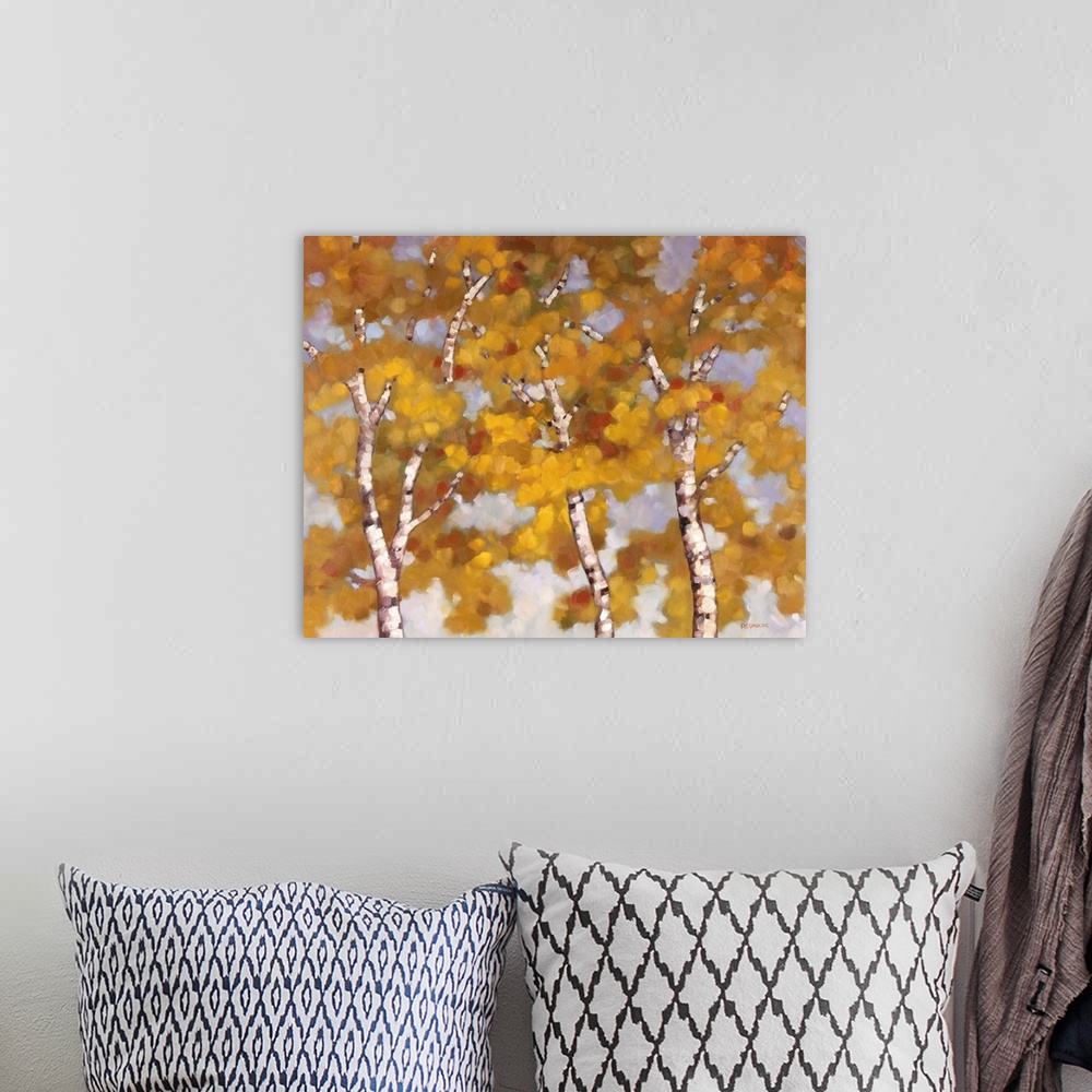 A bohemian room featuring Contemporary painting of slender birch trees filled with orange leaves in the fall.