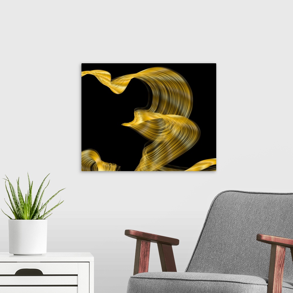 A modern room featuring Abstract artwork created by spiraling, swirling lines leaving behind golden trails.