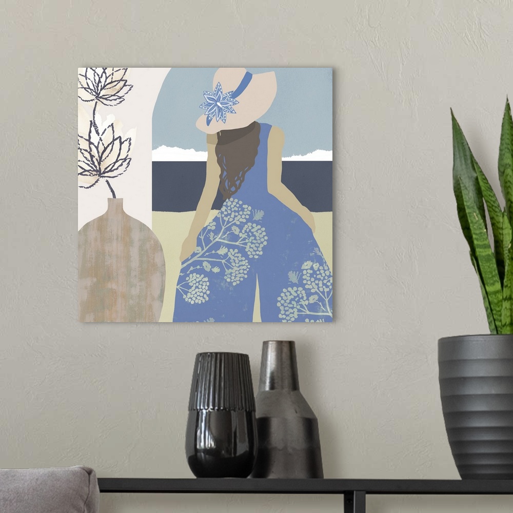 A modern room featuring Blue and pink pastel painting woman in a sunhat looking at the beach.