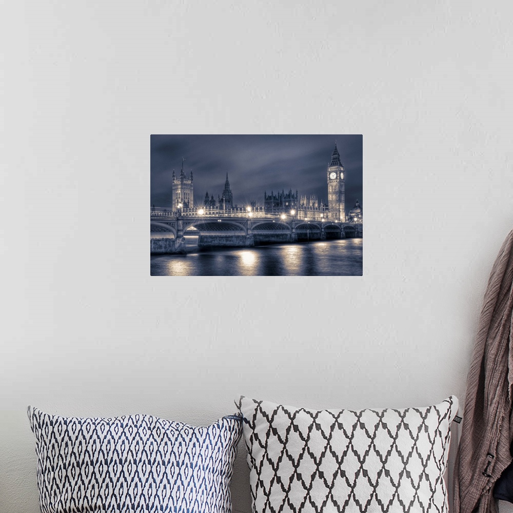 A bohemian room featuring A photograph of the Houses of Parliament with Big Ben in London.