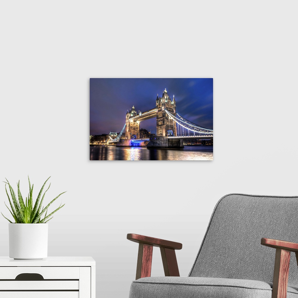 A modern room featuring A photograph of the Tower Bridge spanning the river Thames in London, England.