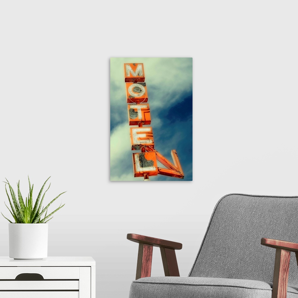 A modern room featuring Vintage Motel Sign