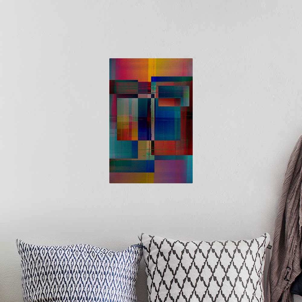 A bohemian room featuring Geometric abstract artwork that consists of multi-colored rectangular shapes.