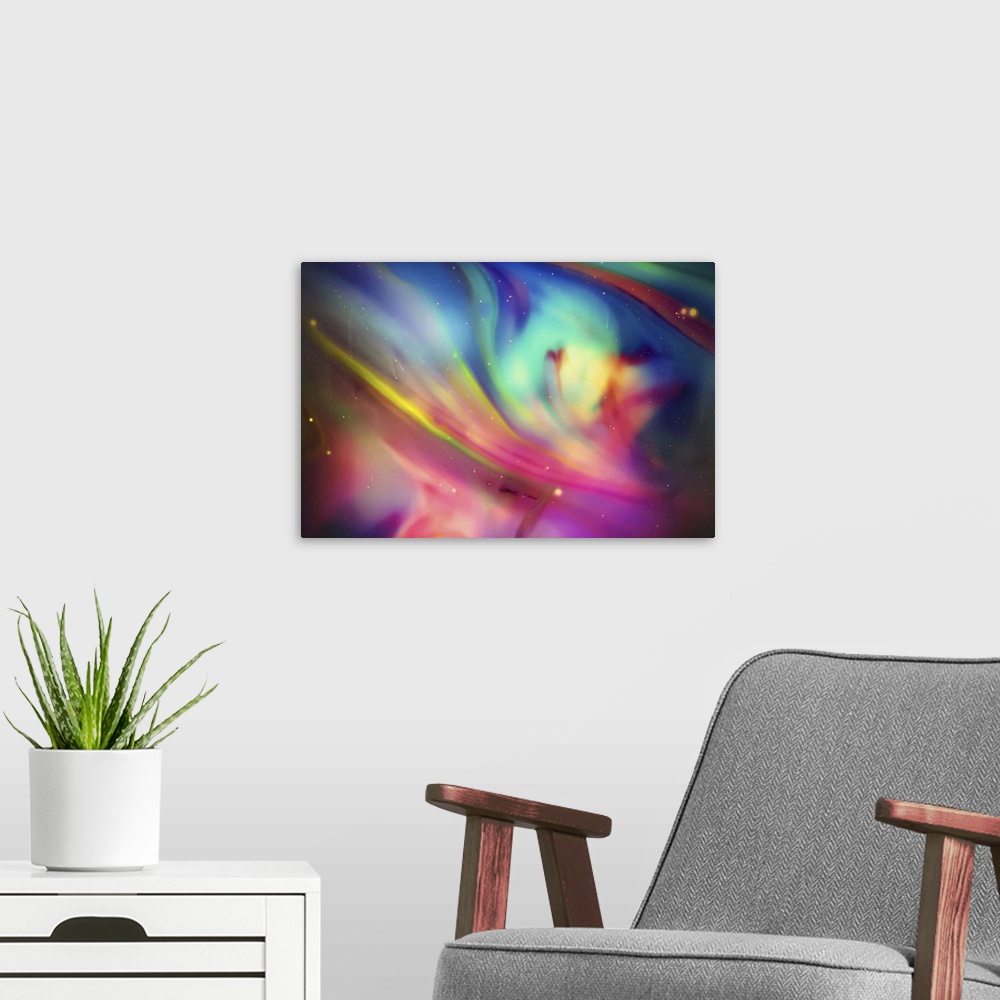 A modern room featuring Abstract photograph of blurred and blended neon rainbow colors and flowing lines.