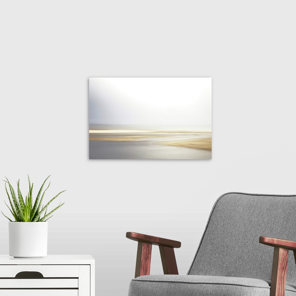 A modern room featuring Artistically blurred photo. Winter view on the lake Flade So in Denmark, late in the afternoon af...