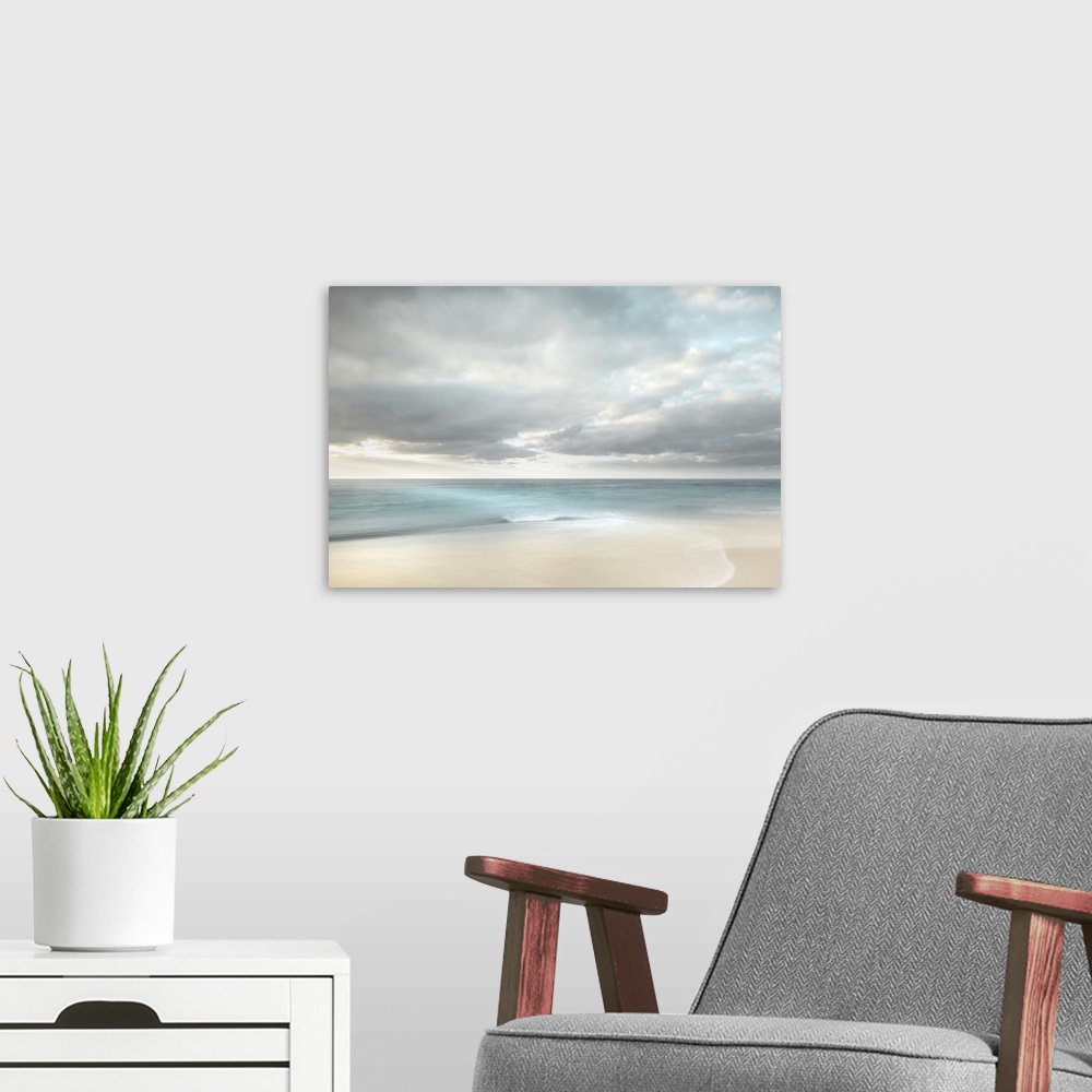 A modern room featuring Romantic deserted beach with teal water and soft clouds.