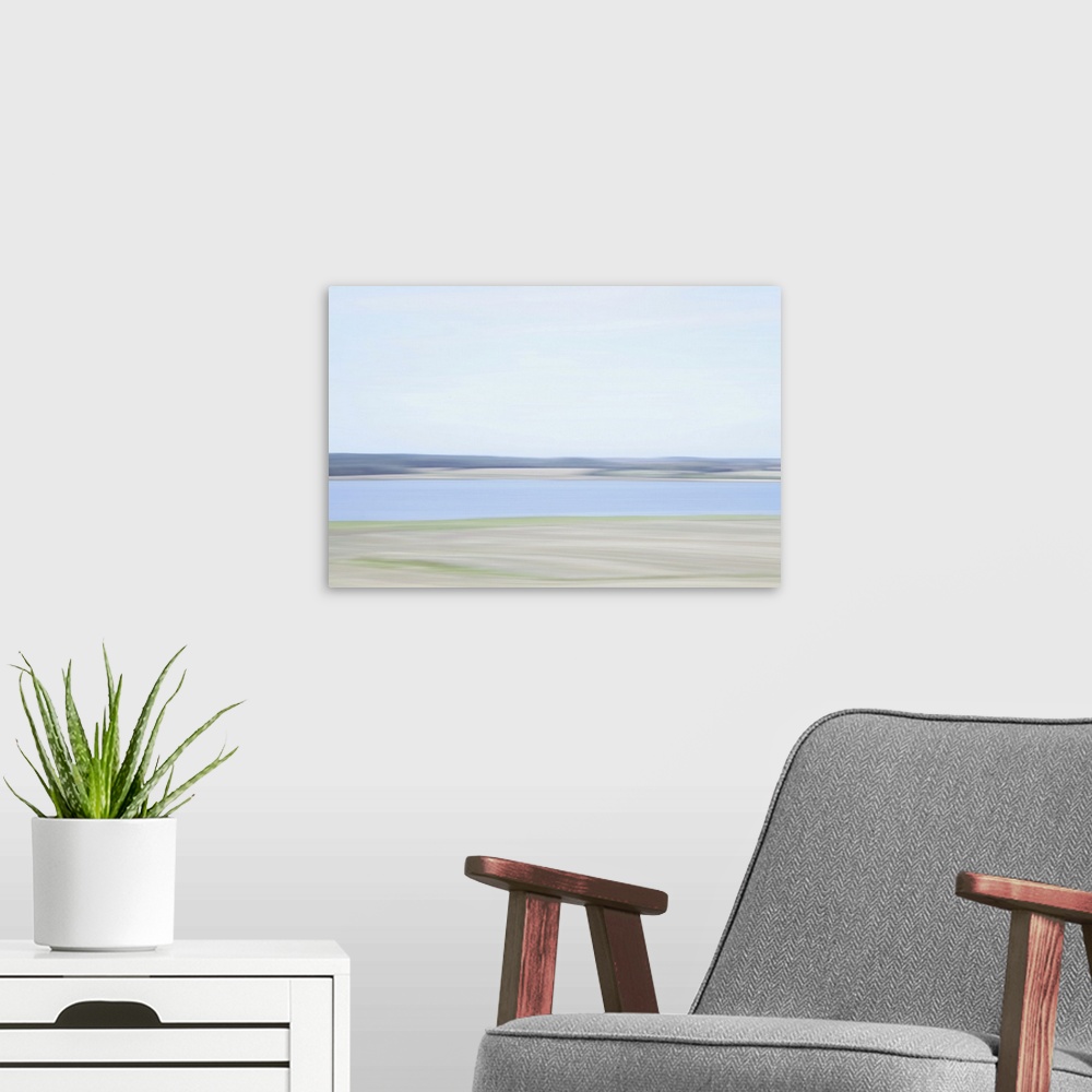 A modern room featuring Artistically blurred photo. Summer view on the fields around the lake Orum So in Denmark.