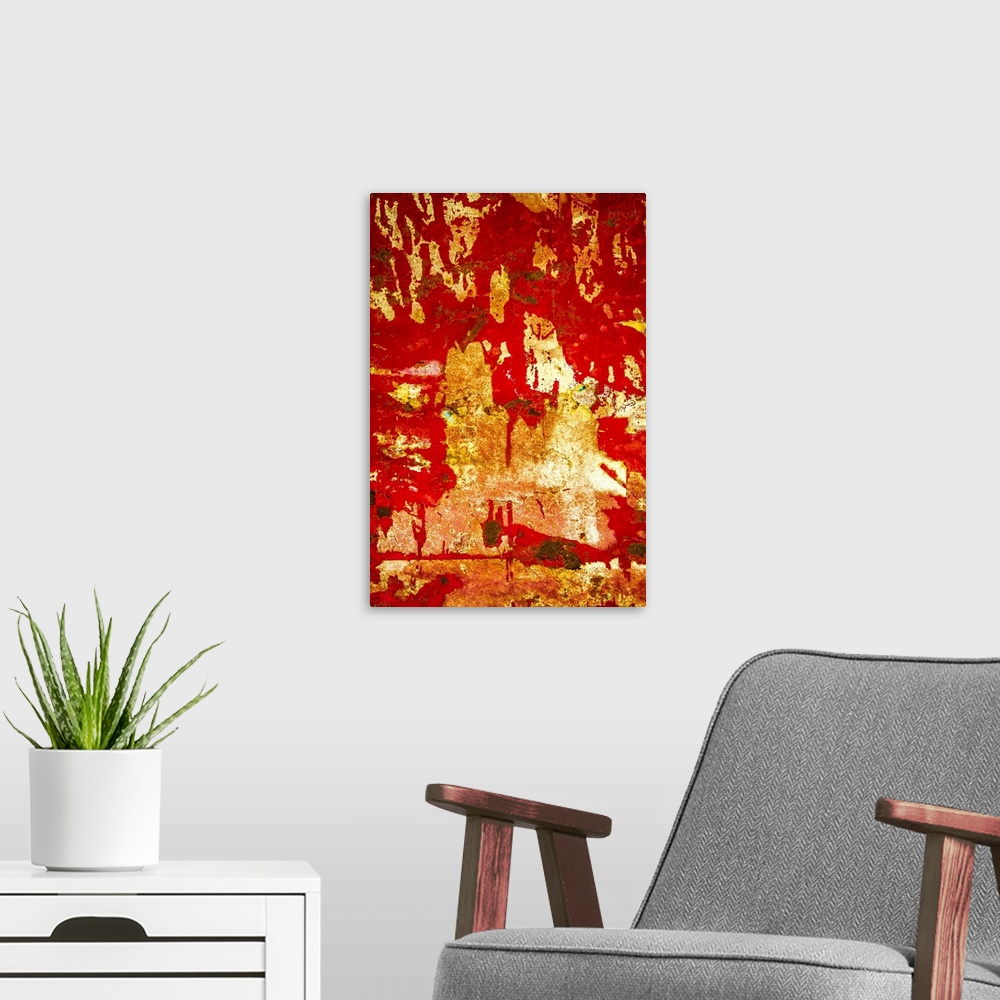 A modern room featuring Close up of graffiti on a wall, creating an abstract image in red and gold.