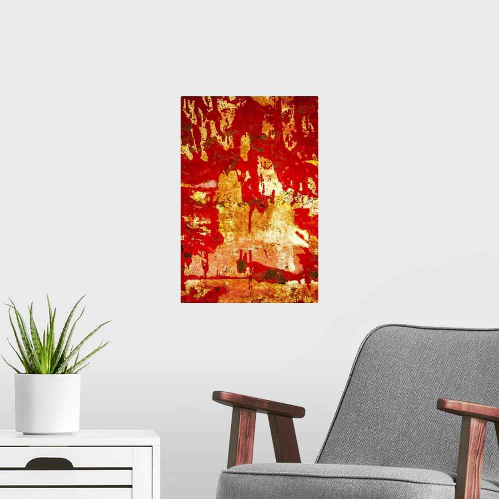 A modern room featuring Close up of graffiti on a wall, creating an abstract image in red and gold.