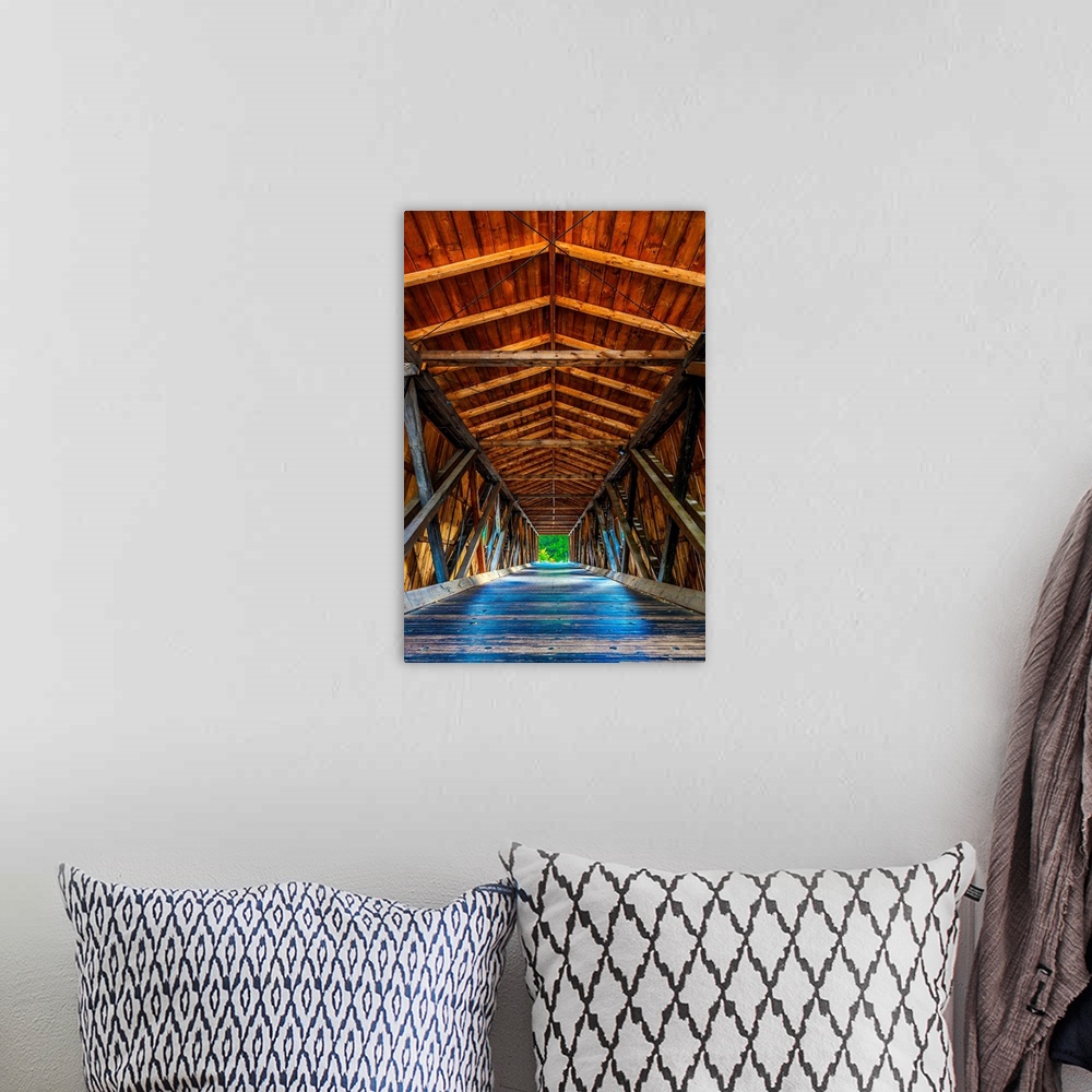 A bohemian room featuring Wooden beams and ceiling of a covered bridge in the Adirondacks, New York.