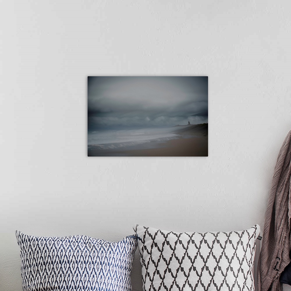 A bohemian room featuring Landscape photograph of the beach on an overcast day, created with multiple exposures.