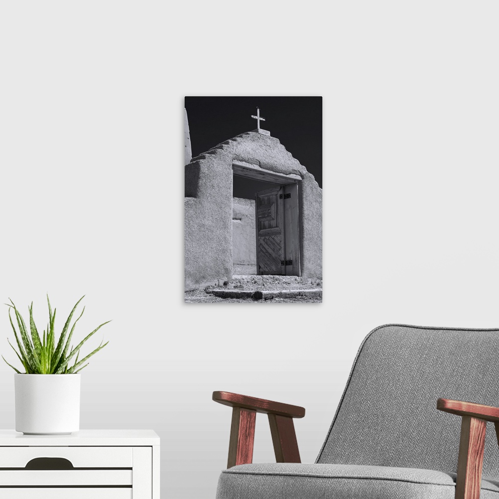 A modern room featuring Photograph of a New Mexico adobe church rendered in the style of Ansel Adams.