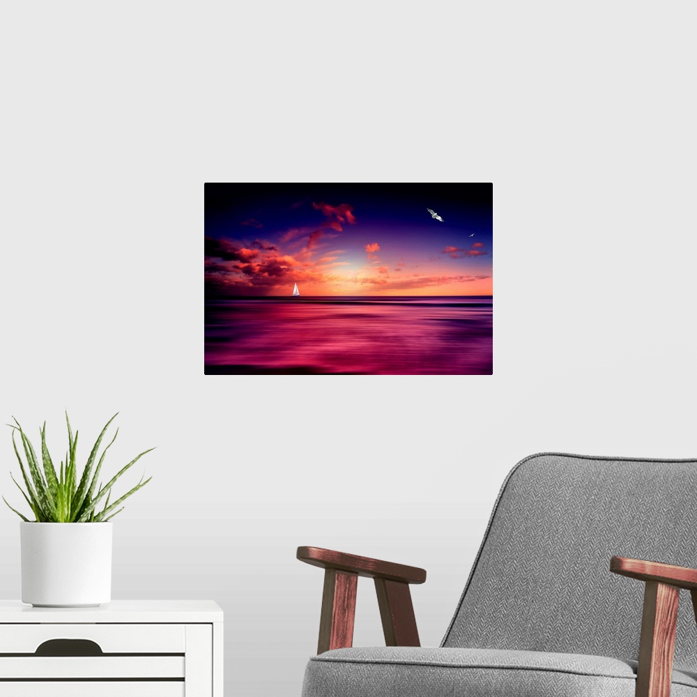 A modern room featuring Sunset with a sailboat on the horizon