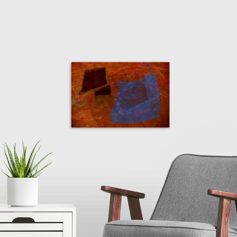 A modern room featuring An abstract expressionistic image of textures and shapes in rich reds, blues and purples.