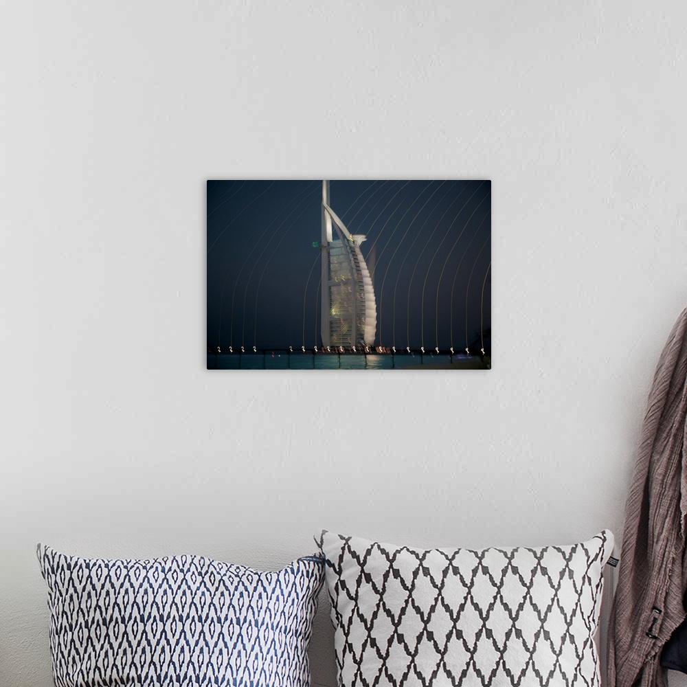 A bohemian room featuring Abstract photo of a skyscraper with blurred lights cascading over.
