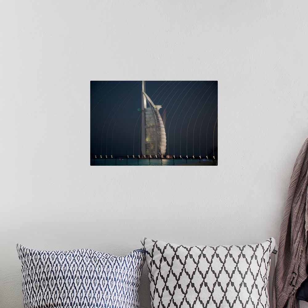 A bohemian room featuring Abstract photo of a skyscraper with blurred lights cascading over.
