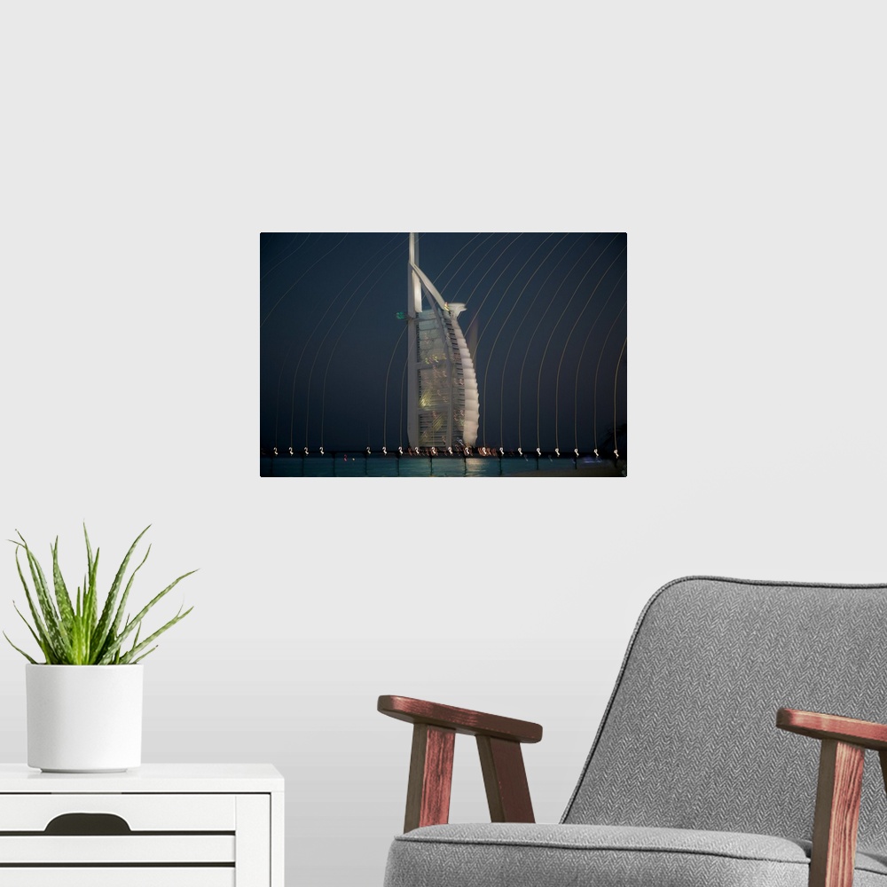 A modern room featuring Abstract photo of a skyscraper with blurred lights cascading over.