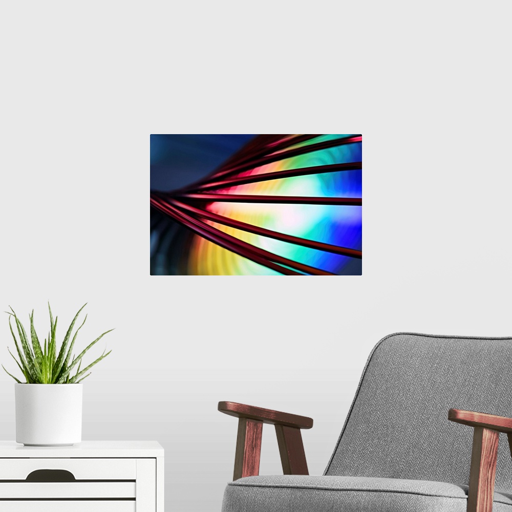 A modern room featuring Fine art abstract photograph of cords in front of a rainbow pattern.