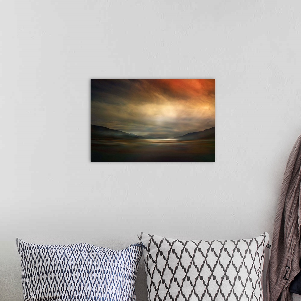A bohemian room featuring Fine art photo of a valley dimly lit by glowing clouds at sunset in Canada.