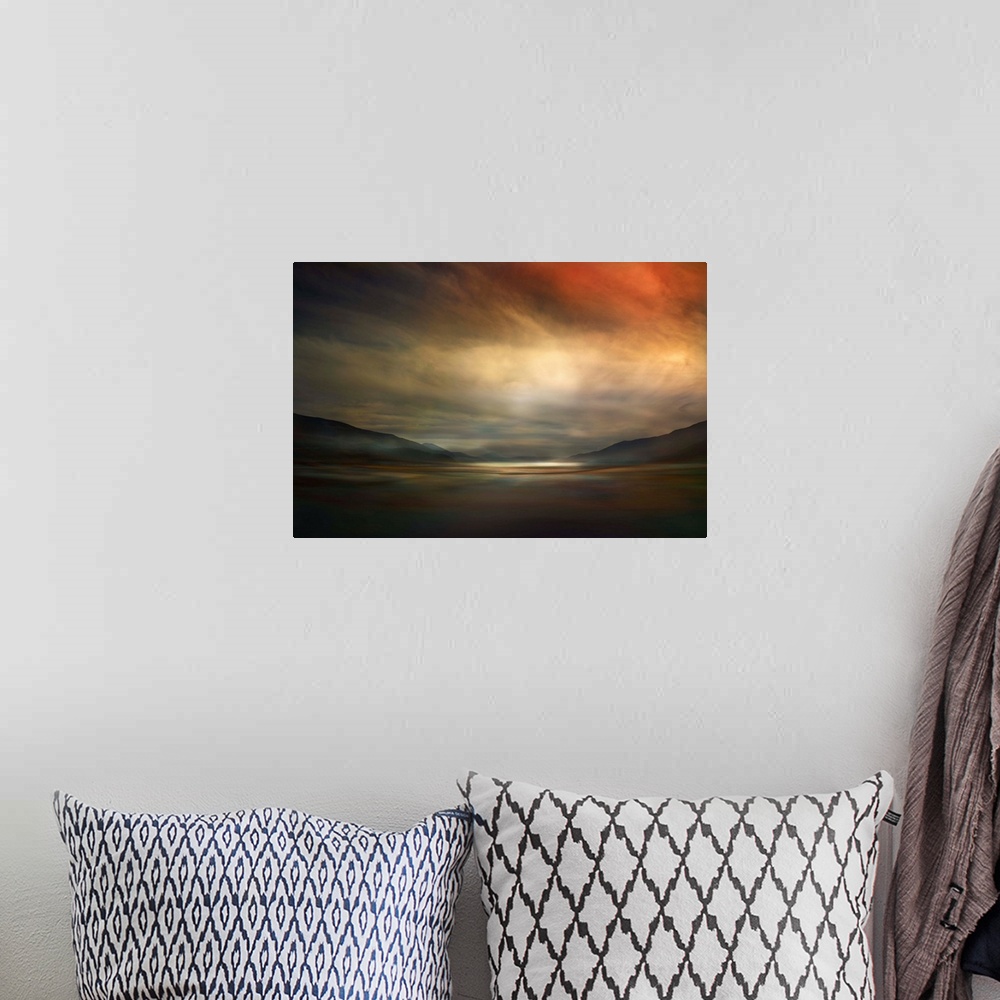 A bohemian room featuring Fine art photo of a valley dimly lit by glowing clouds at sunset in Canada.