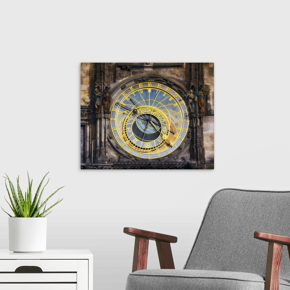 A modern room featuring View of the Astronomical Clock or Orloj on the Old Town Hall in Prague, Czech Republic.