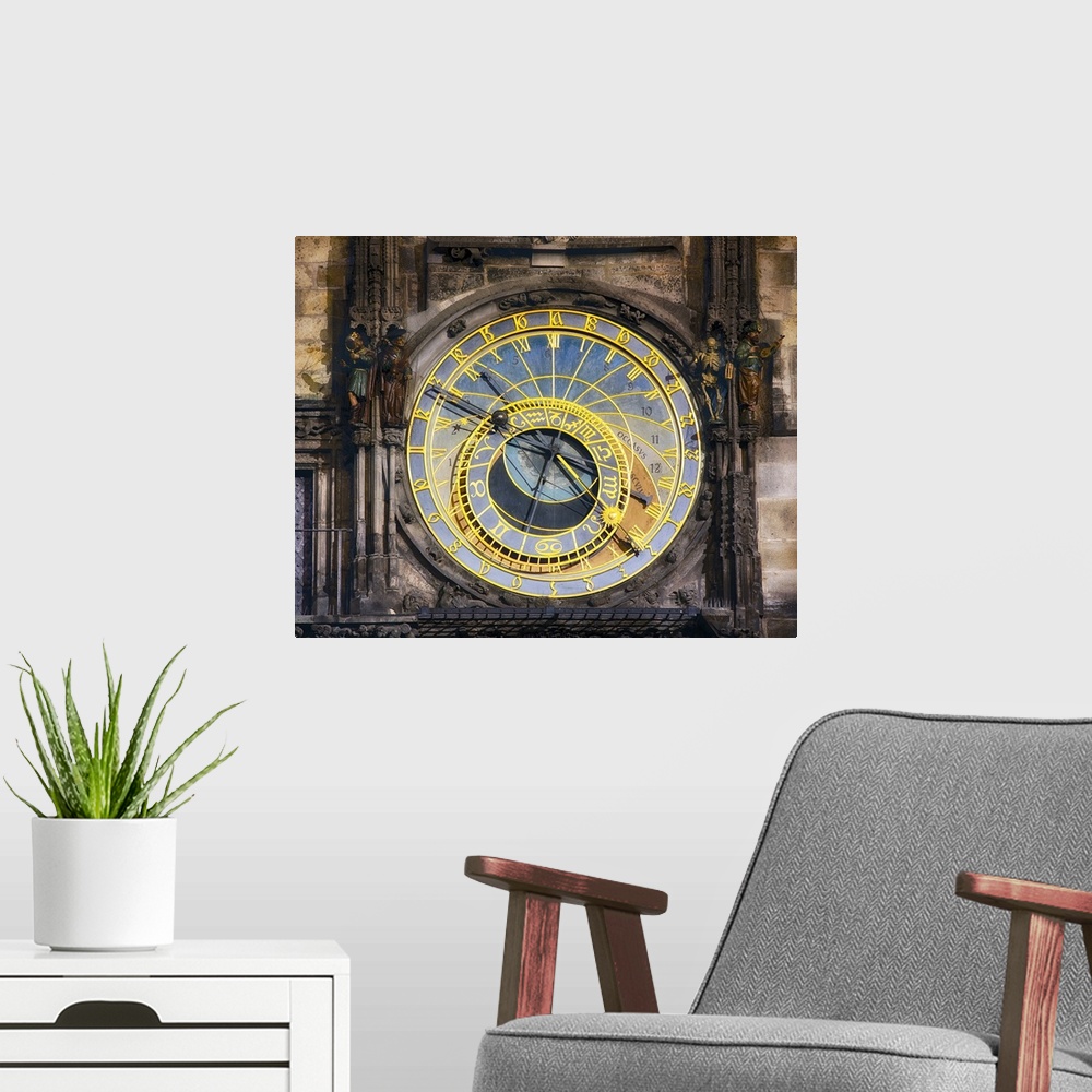 A modern room featuring View of the Astronomical Clock or Orloj on the Old Town Hall in Prague, Czech Republic.