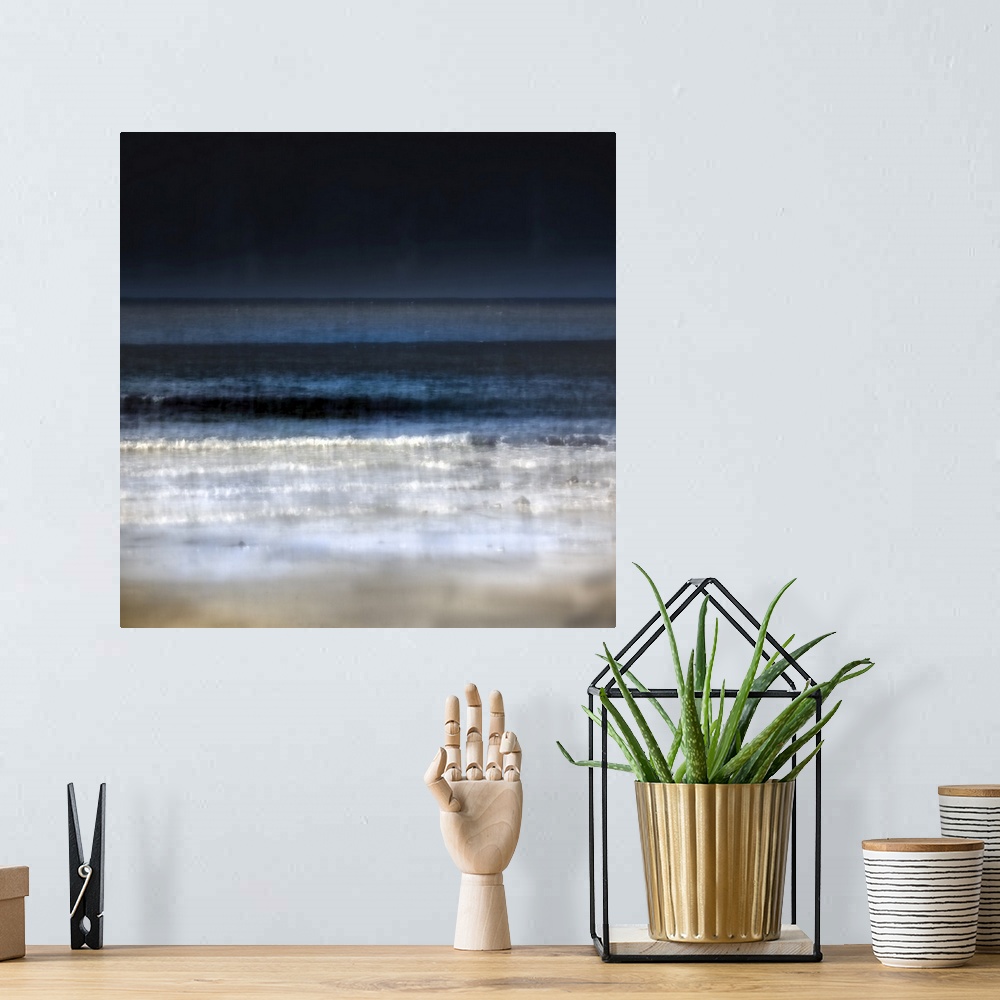 A bohemian room featuring Minimalist navy blue and white abstract beach scene with dark skies and waves breaking on sand.