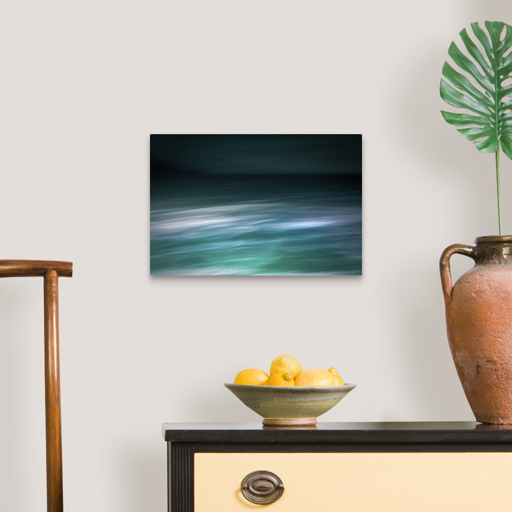 A traditional room featuring Modern photography abstract seascape abstract in teal and white with dark sky and waves.