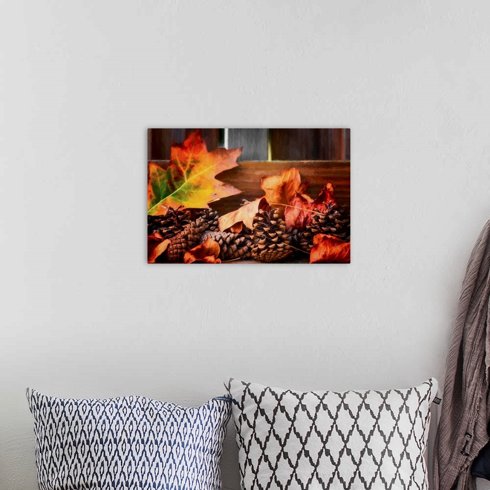 A bohemian room featuring Fine art photograph of Autumn leaves and pine cones on a wooden background with a painted look.