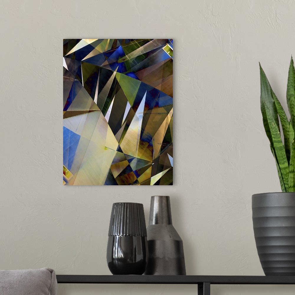 A modern room featuring Abstract photograph made of intersecting angles and lines in varying blue and yellow shades.