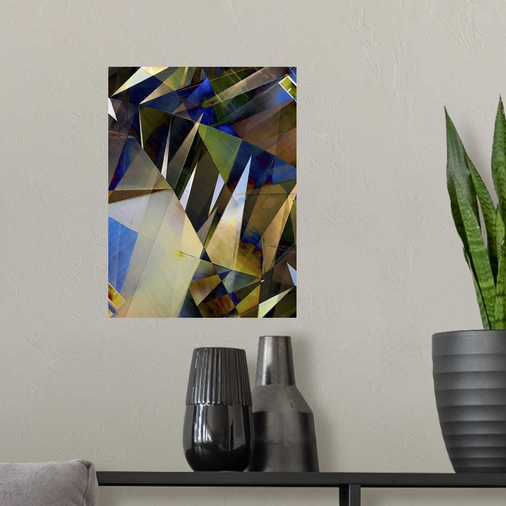 A modern room featuring Abstract photograph made of intersecting angles and lines in varying blue and yellow shades.